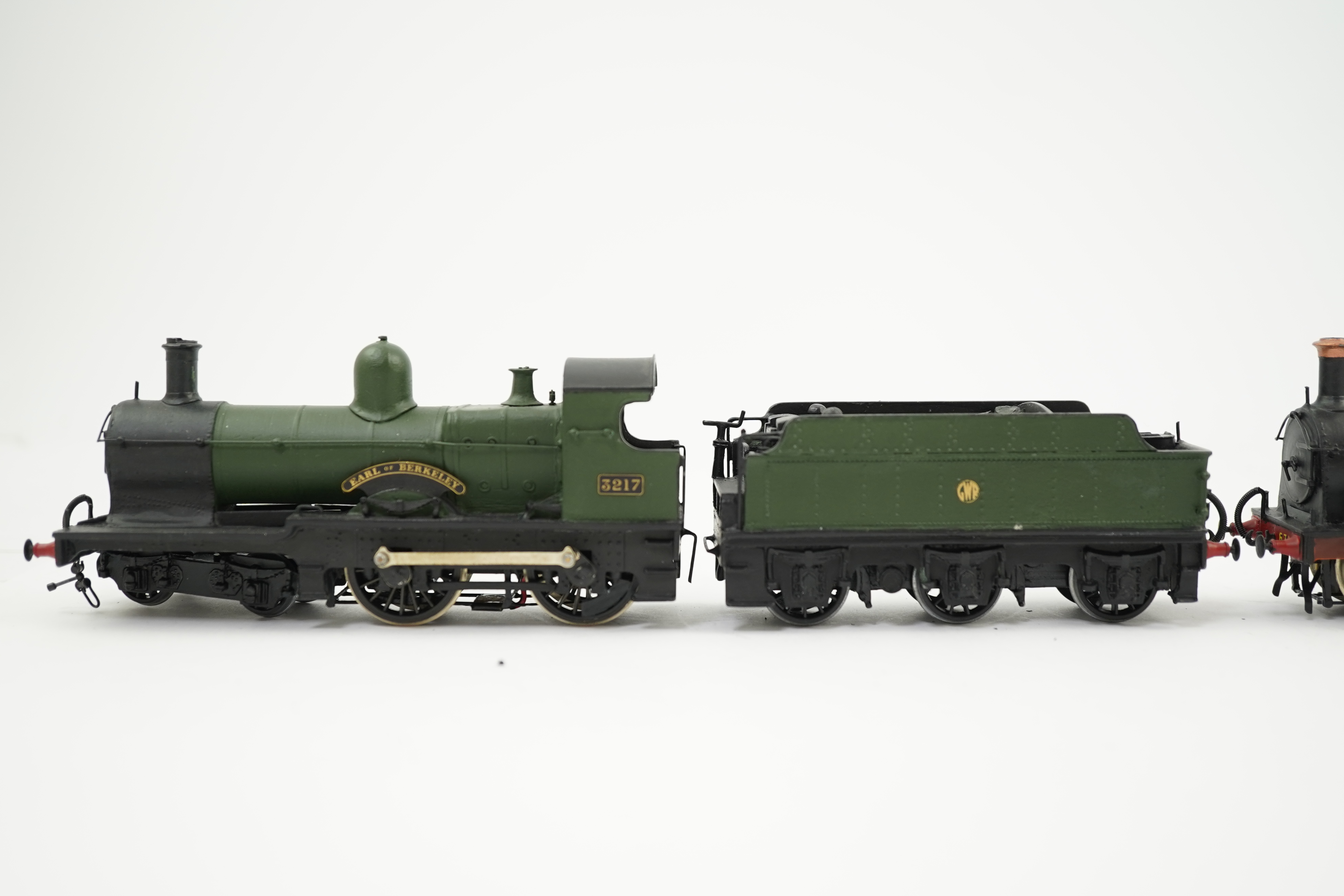 Two 00 gauge brass and white metal kit built GWR tender locomotives; an Armstrong 0-6-0, 671, together with an Earl class 4-4-0, Earl of Berkeley 3217, constructed, painted and lined to a high standard, both motored for